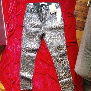 Animal print in black & gold, coated black jeans